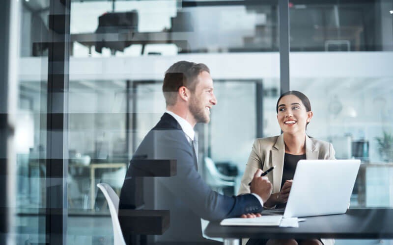 Two people meeting on laptop