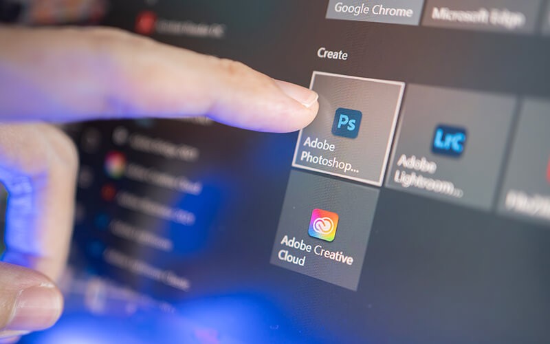 Creative designer using Adobe software