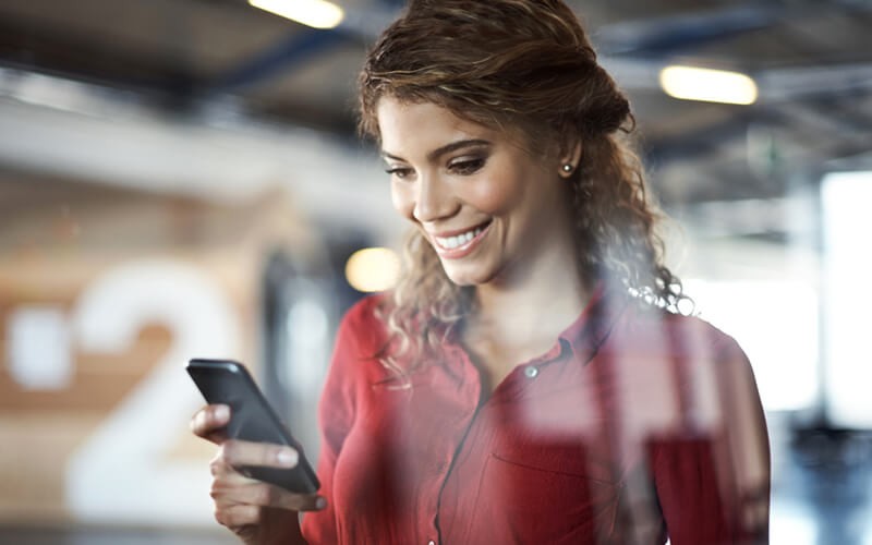 Woman using mobile device