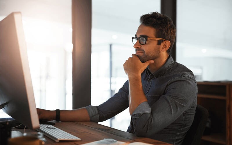 Man looking at monitor