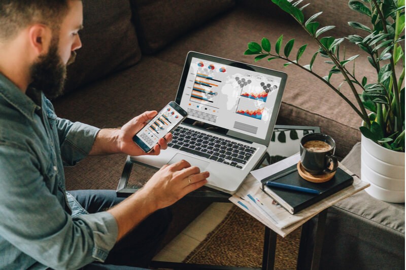 Business manager using Office 365 on tablet computer in modern office